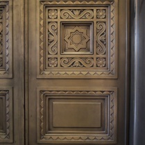 A Moorish star on the elevator doors.